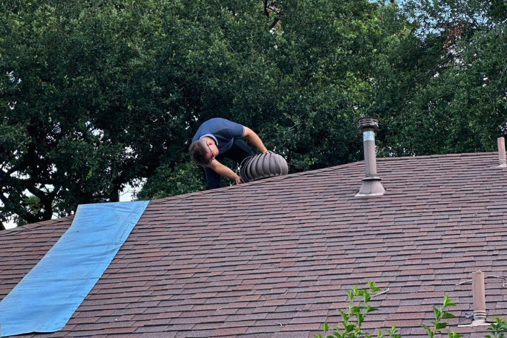 Devon Inspects the roof